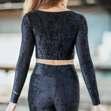 back of long sleeved pavi top in velvet black
